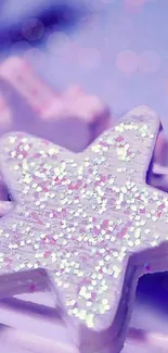 Purple star with glittery accents on a dreamy background.