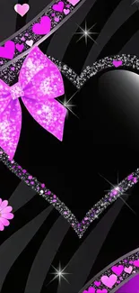 Glittery heart and bow with pink accents wallpaper.