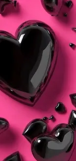 Glossy black hearts on a vibrant pink background.