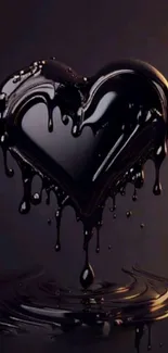 Artistic glossy black heart with a dripping effect on a dark background.