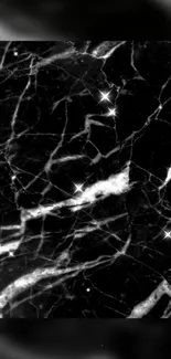 Glossy black marble wallpaper with star-like highlights.