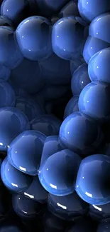 Glossy blue 3D spheres forming an abstract phone wallpaper.