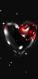 Glossy black heart with red accent on dark background.