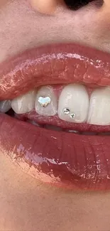 Close-up of glossy lips and gem-decorated teeth.