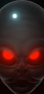 Alien face with glowing red eyes on dark background wallpaper.