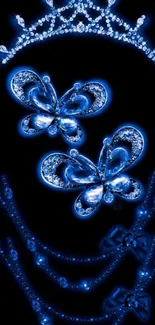 Glowing blue butterflies and jewels on black background.