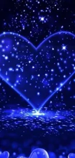 Glowing blue heart wallpaper with stars and vibrant colors.