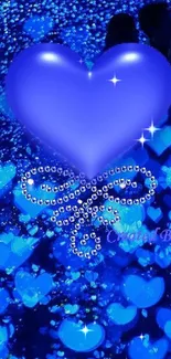 Glowing blue heart wallpaper with bokeh effect.