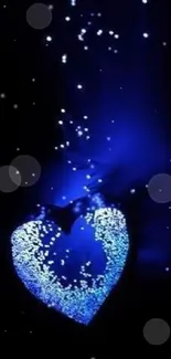 Glowing blue heart with sparkles on dark background.