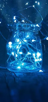 Glowing blue fairy lights in a jar against a night sky backdrop.