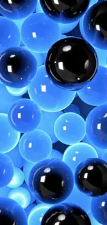 Luminous blue and black spheres creating a stunning abstract wallpaper.