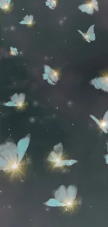 Glowing butterflies soar against a dark mystical backdrop in this elegant mobile wallpaper.