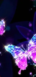 Neon glowing butterfly wallpaper with vibrant colors on a dark background.