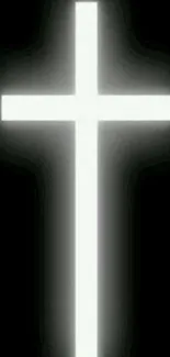 Glowing white cross on a black background.