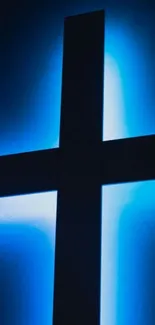 Glowing cross with a blue halo on phone wallpaper.