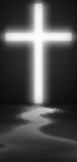 Black-and-white wallpaper with glowing cross and reflection.