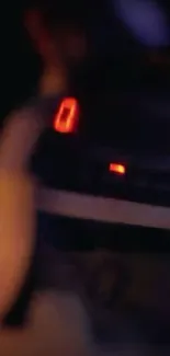 Blurred car dashboard glowing at night