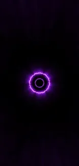 Purple glowing energy ring on dark background.