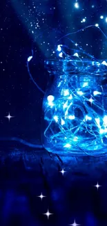 A glowing mason jar with fairy lights against a starry deep blue background.