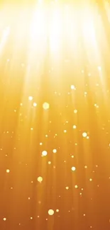 Golden light rays and sparkles wallpaper.