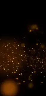 Glowing golden particles on dark background for mobile wallpaper.