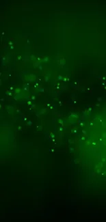 Dark green wallpaper with glowing particles.