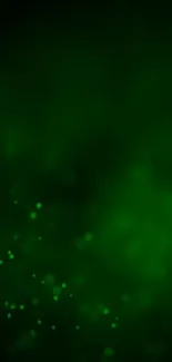 Glowing green abstract wallpaper with luminous particles on a dark background.