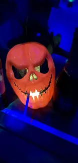 Glowing pumpkin face with neon effect for Halloween wallpaper.