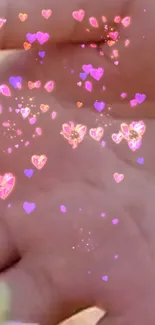 Wallpaper with glowing lavender hearts on a hand