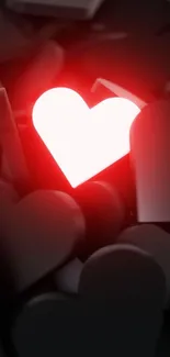 Glowing red heart on dark background mobile wallpaper.