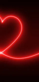 Glowing red heart neon design on black background.