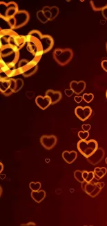 Glowing orange hearts on a dark wallpaper background