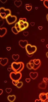 Mobile wallpaper with glowing red hearts on a dark background.