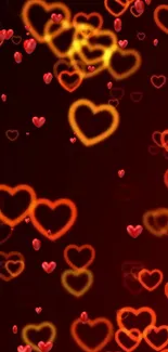 Red and orange glowing heart pattern wallpaper for mobile phones.