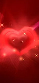 Vibrant red heart glowing with sparkles on a dark background.