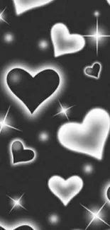 Glowing hearts on a dark background with a romantic and elegant design.