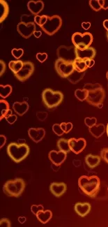 Glowing orange and yellow hearts on a red background.