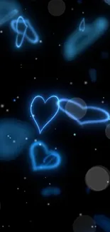 Glowing neon hearts on a dark, modern background wallpaper.