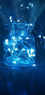 Glowing fairy lights in a jar against a starry dark blue background.