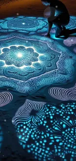 Intricate glowing mandala sand art illuminating the darkness.