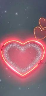 Neon heart glowing against dark background.