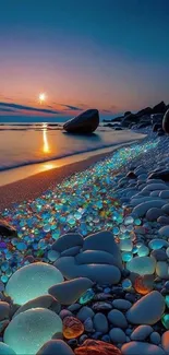 Glowing pebbles on a beach at sunset, with vibrant ocean colors.