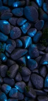 Dark pebbles with glowing blue lines form a stunning mobile wallpaper.