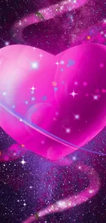 Glowing pink heart on a vibrant galaxy background wallpaper.