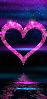 A glowing pink heart over cosmic water reflection wallpaper.