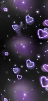 Dreamy purple neon hearts with stars on dark background wallpaper.