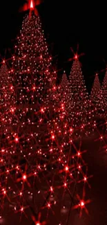 Wallpaper of glowing red Christmas trees.