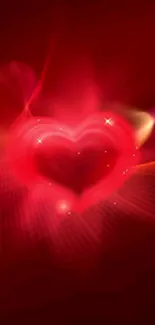 Glowing red heart on vibrant background wallpaper.