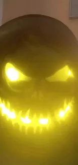 Eerie glowing skull with bright yellow eyes and teeth on a dark background.