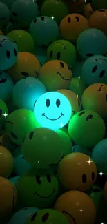 Aqua glowing smiley face among multicolored balls.